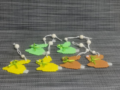 Bügelperlen Osteranhänger in Gelb, Braun und Grün, Set von 6 Stück, 6,5x7 cm – handgefertigte Osterdekoration.