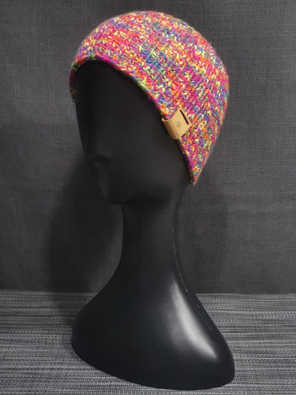 Buntes handgestricktes Kinder-Stirnband in Einheitsgröße, perfekt für kalte Tage und modische Akzente. 🌈🧶