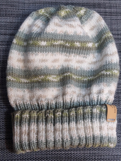 Gestrickte Kindermütze in Grün aus Gründl Baby Color Wolle – handmade